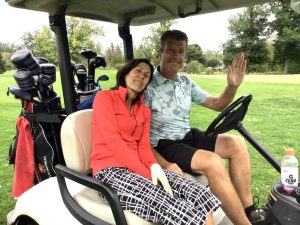 Joyce and Kirk Brannon in golf cart