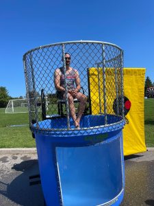 Person in dunk tank at Valleywood party