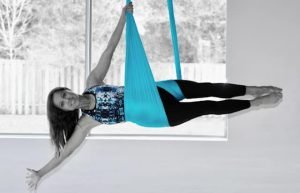 Caron doing aerial yoga