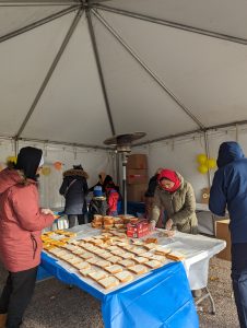 Volunteers making sandwiches
