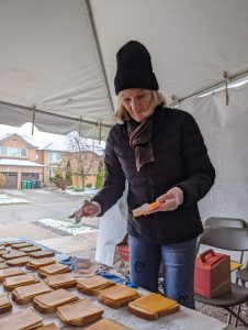 Councillor Early making sandwiches